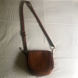 Fossil purse. 7 inches x 7 1/2 inches   Strap 20 inches long.